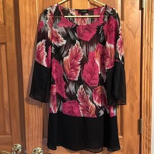 Like new swimsuit coverup in sheer fabric